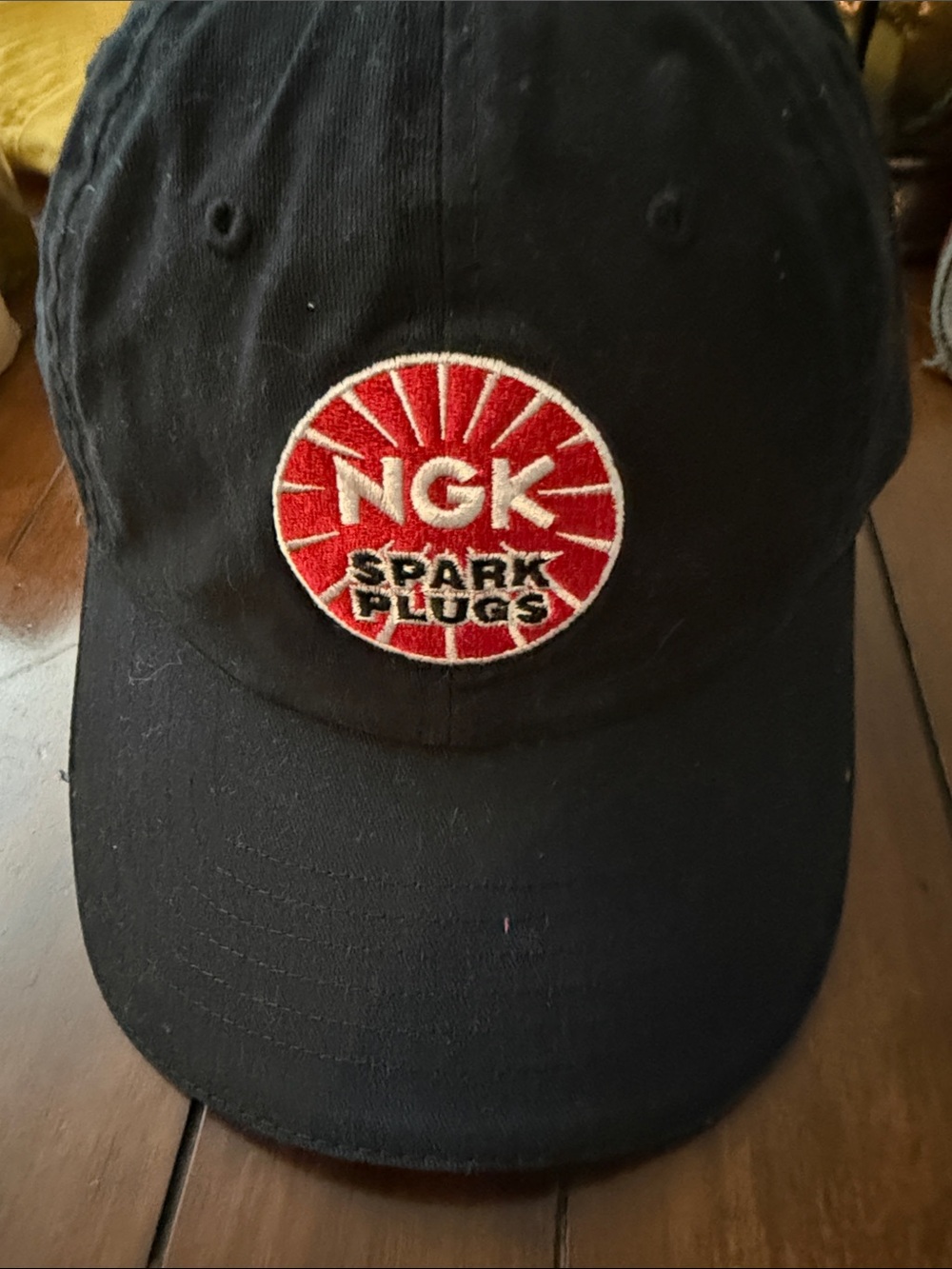 GK Black Baseball Cap with Red NGK Patch